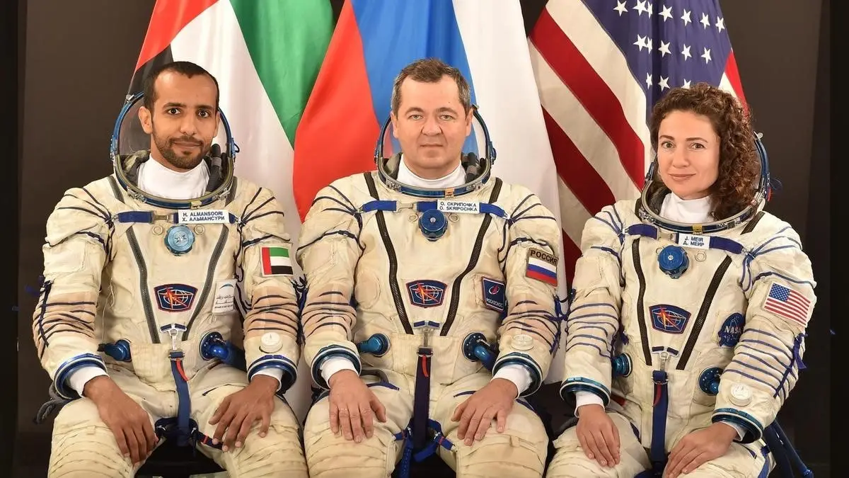 UAE astronaut Hazza Al Mansouri with Russian cosmonaut Oleg Skripochka and American astronaut Jessica Meir