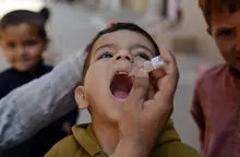Child being administered medicine